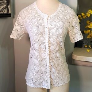 Hand Crocheted 100% cotton top. So lovely well made. Cream color size large100%